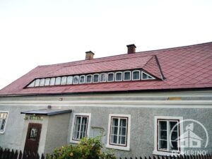 Čištění střechy DOMERINO provádí z plošiny